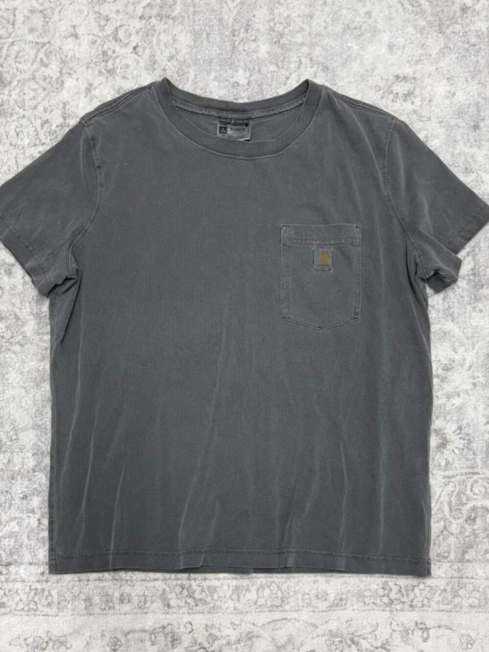 women’s faded Carhartt pocket tee shirt